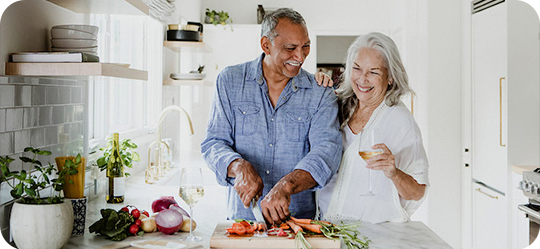 older-couple-family-relationship-cooking-healthy-meal-nutrition-crop