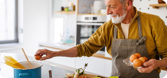 older-man-cooking-healthy-nutrition-food-corp